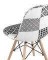 Обеденная группа стол Rondo раскладной 100-135*100 см белый, стулья Eames пэчворк черно-белые